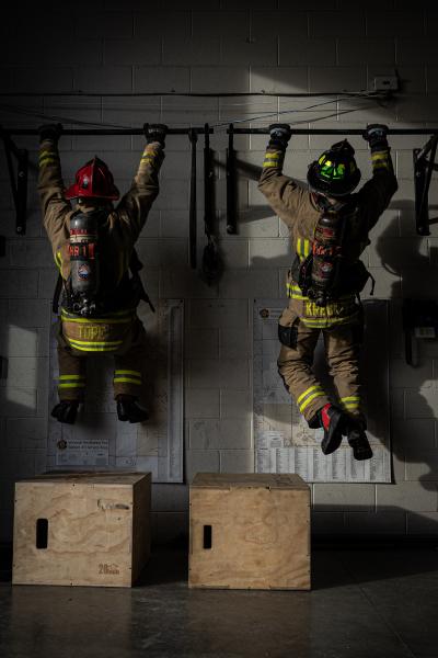 Firefighters Doing Pull-Ups